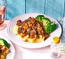Balsamic beef stew with veggie mash and broccoli on two plates