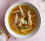 Slow cooker chicken soup served in a bowl