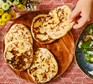 Several flatbreads with garlic butter