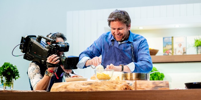 James Martin performing on stage at the Good Food Show