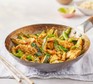 Lemongrass & coconut chicken stir-fry in a wok