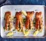 Grilled lobster tails with lemon & herb butter served on a baking tray