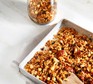 Nuts and seeds granola on a baking tray