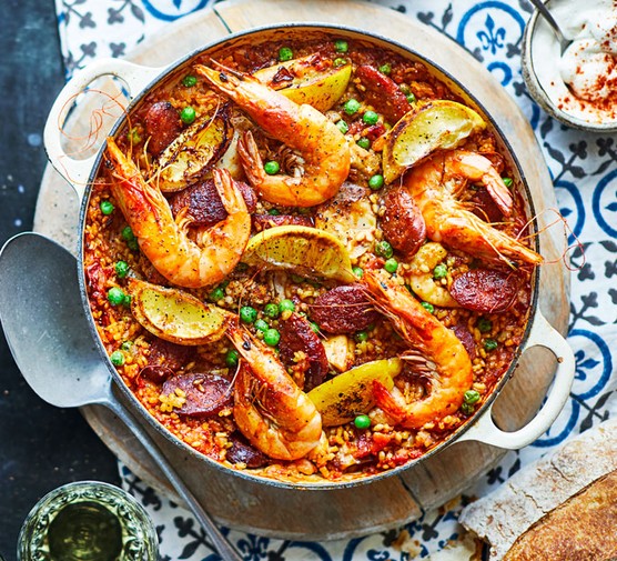 Paella with king prawns in a dish