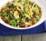 A bowl of vegetable tagine with summer vegetables, and pulses