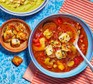Bowls of roasted vegetable soup with halloumi ‘croutons’