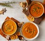 Three bowls of slow-cooker pumpkin soup