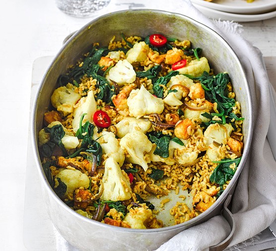 Spicy cauliflower & halloumi rice in a large oven dish