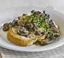 Creamy mustard mushrooms on toast, topped with chives